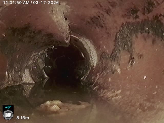 CCTV image of cracked and damaged drain pipe before relining in South Auckland
